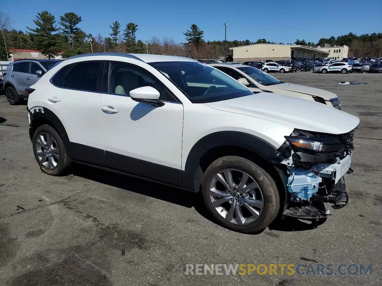 4 Photograph of a damaged car 3MVDMBCMXPM547654 MAZDA CX30 2023
