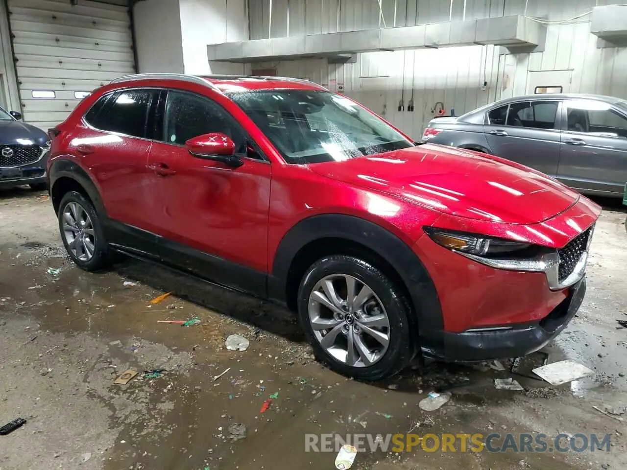 4 Photograph of a damaged car 3MVDMBDM3PM527681 MAZDA CX30 2023