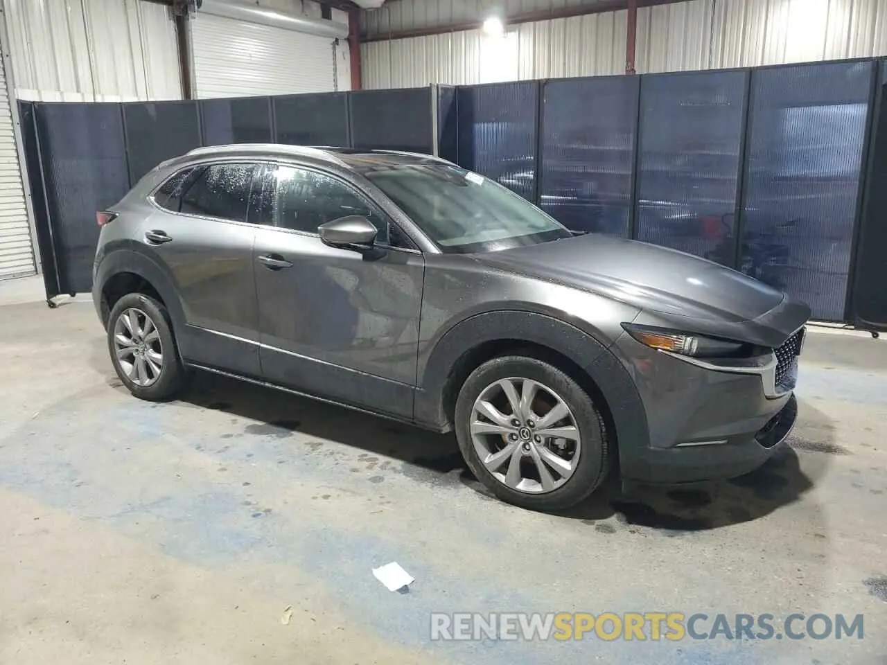 4 Photograph of a damaged car 3MVDMBDMXPM516001 MAZDA CX30 2023