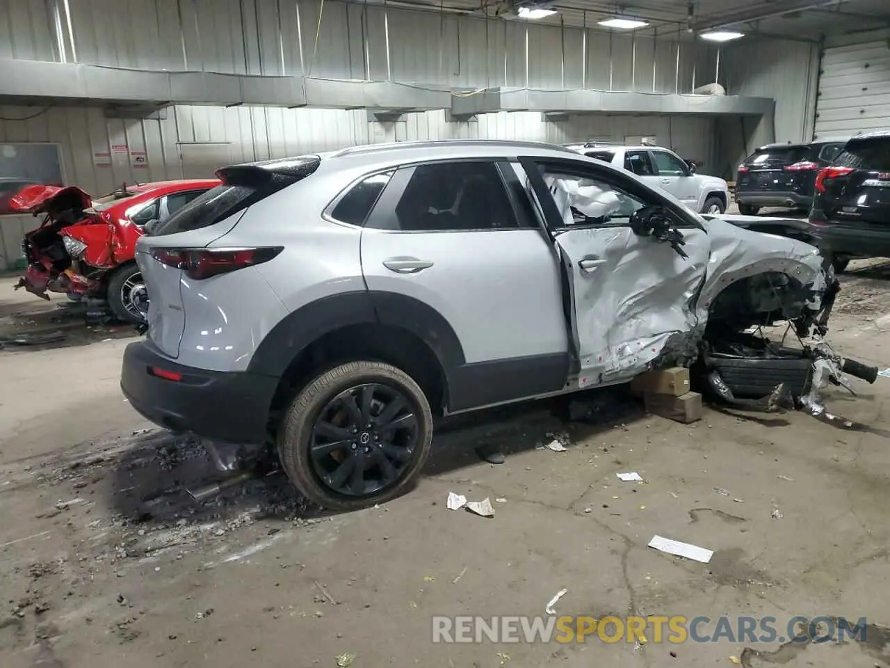 3 Photograph of a damaged car 3MVDMBBM0RM717301 MAZDA CX30 2024
