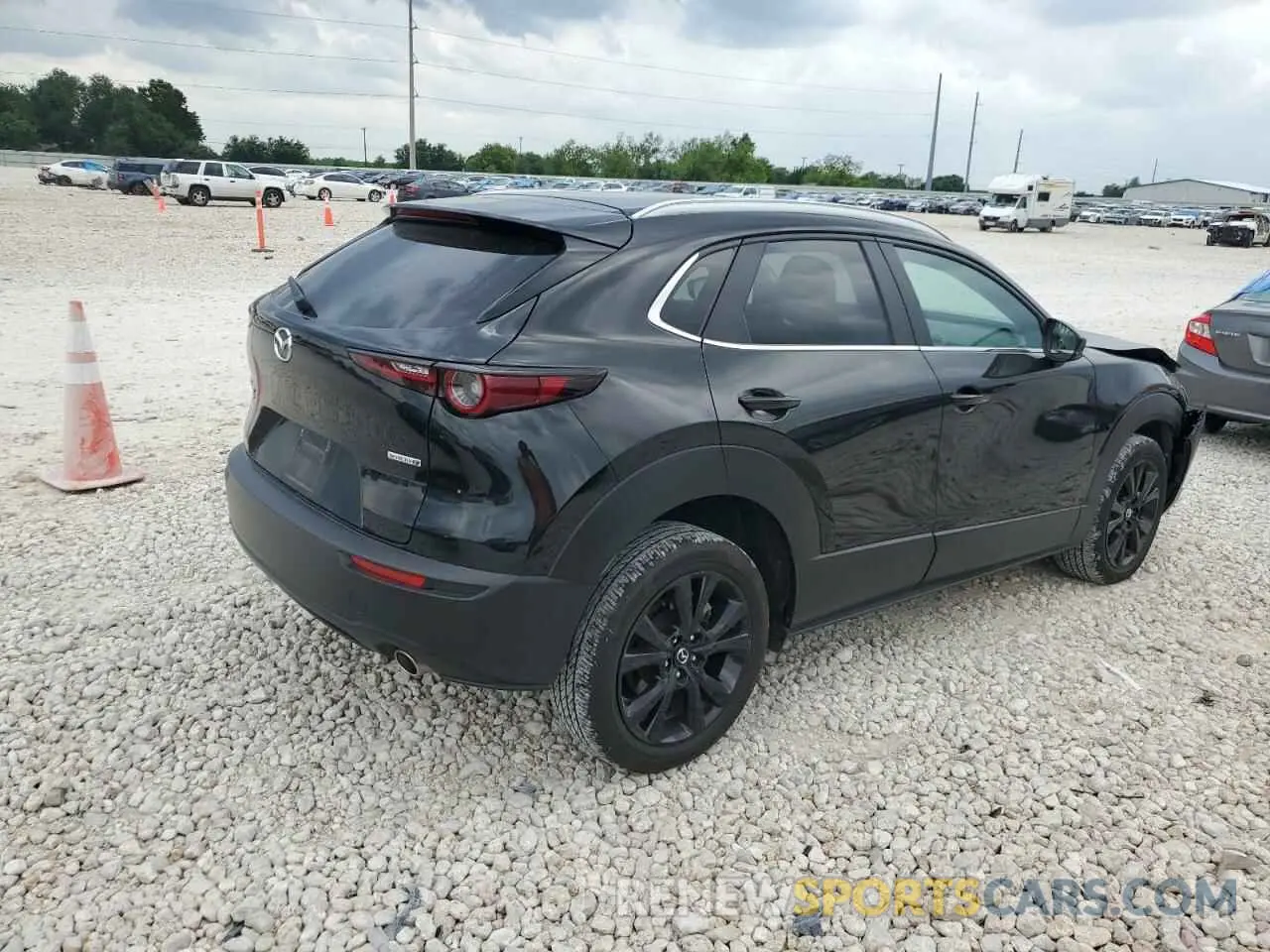 3 Photograph of a damaged car 3MVDMBBM7RM611928 MAZDA CX30 2024