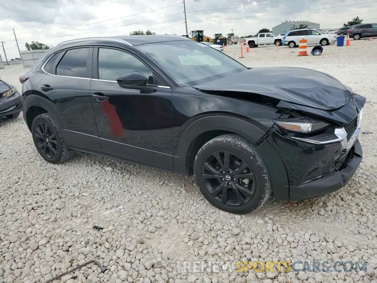 4 Photograph of a damaged car 3MVDMBBM7RM611928 MAZDA CX30 2024
