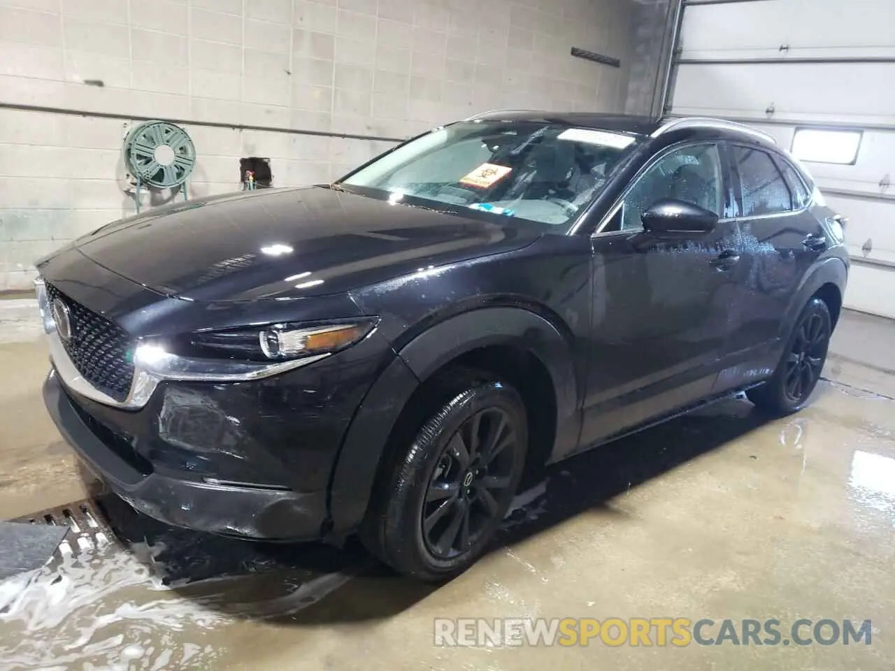 1 Photograph of a damaged car 3MVDMBBM7RM698567 MAZDA CX30 2024