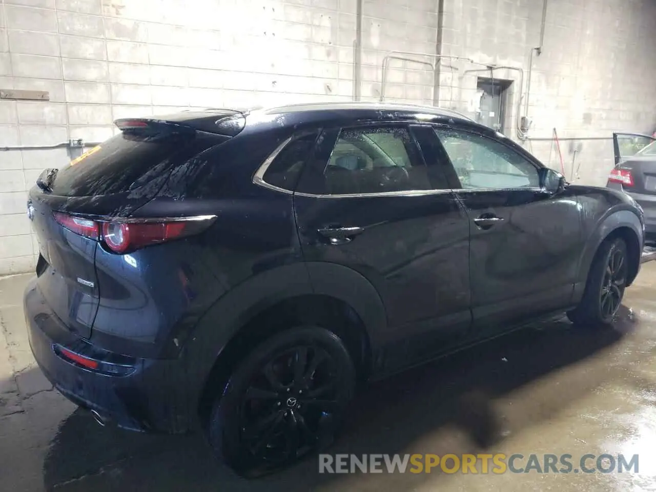 3 Photograph of a damaged car 3MVDMBBM7RM698567 MAZDA CX30 2024