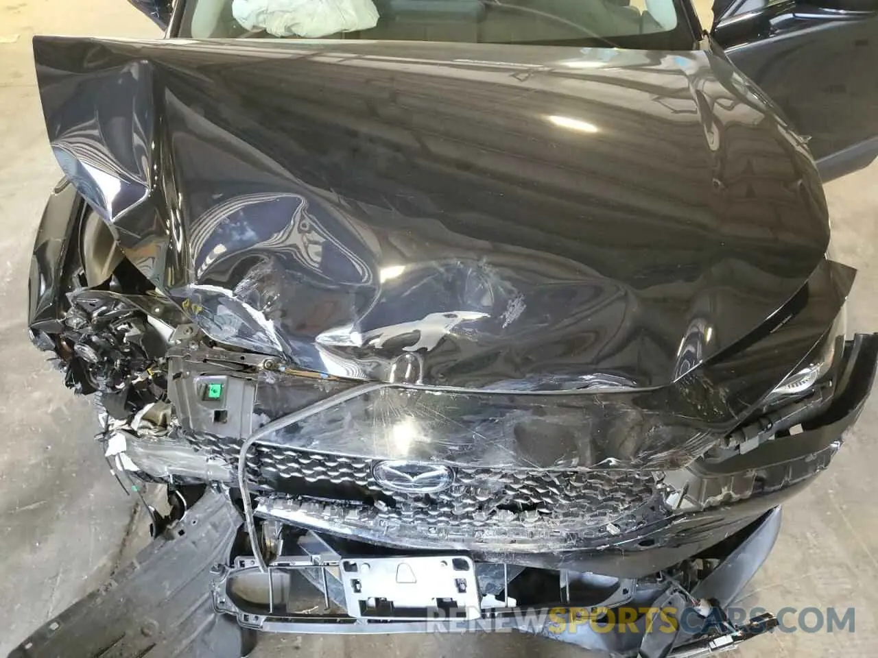12 Photograph of a damaged car 3MVDMBBM8RM675508 MAZDA CX30 2024
