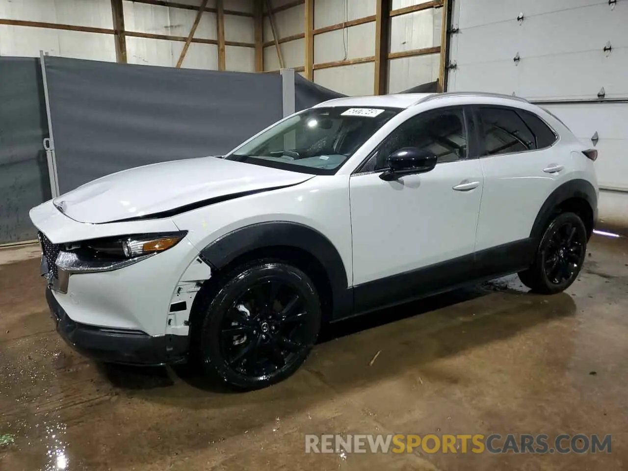 1 Photograph of a damaged car 3MVDMBBMXRM649430 MAZDA CX30 2024