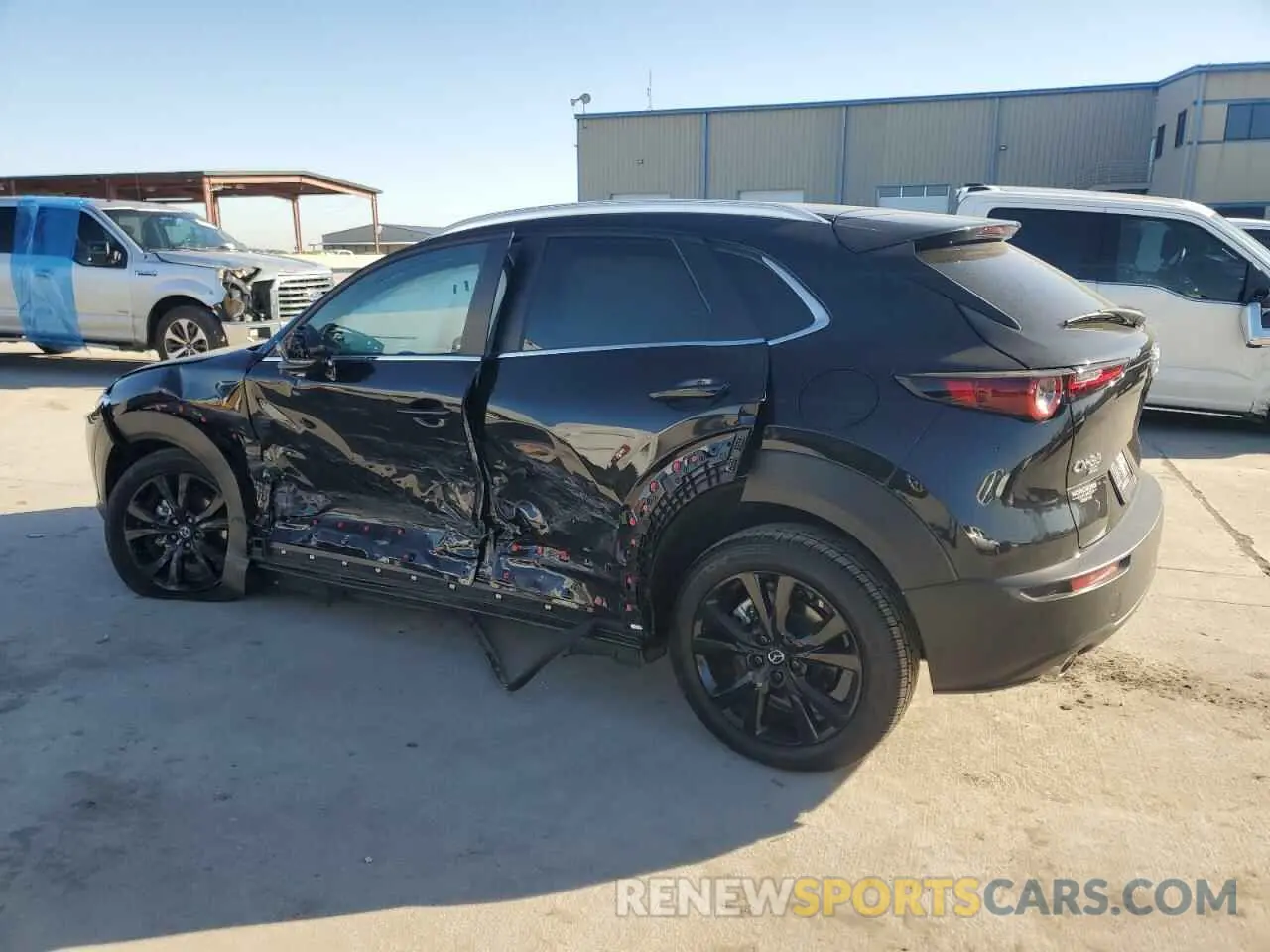 2 Photograph of a damaged car 3MVDMBBMXRM710825 MAZDA CX30 2024
