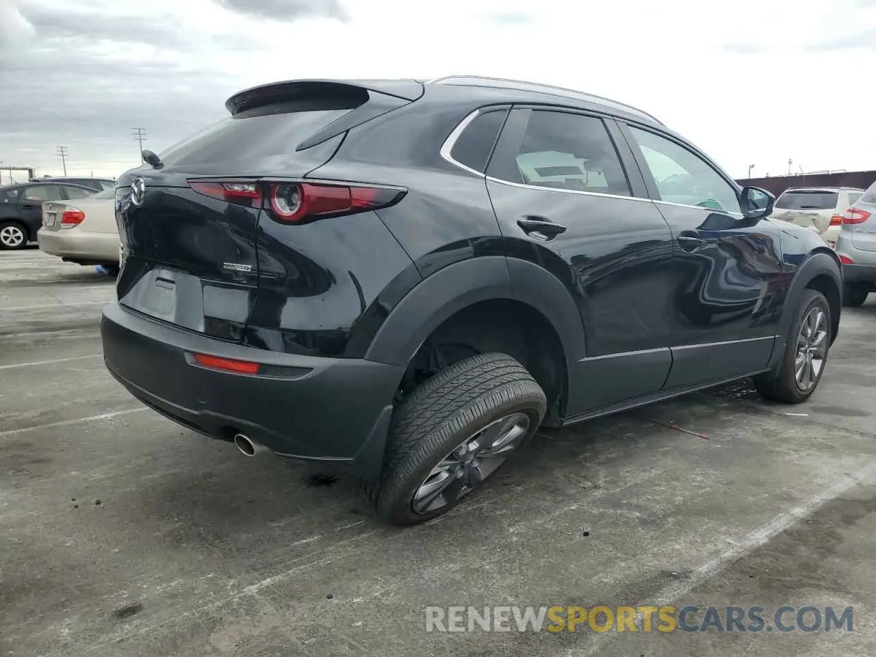 3 Photograph of a damaged car 3MVDMBCM1RM618954 MAZDA CX30 2024