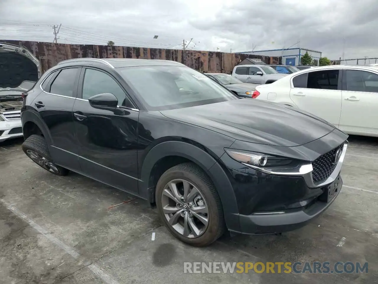 4 Photograph of a damaged car 3MVDMBCM1RM618954 MAZDA CX30 2024