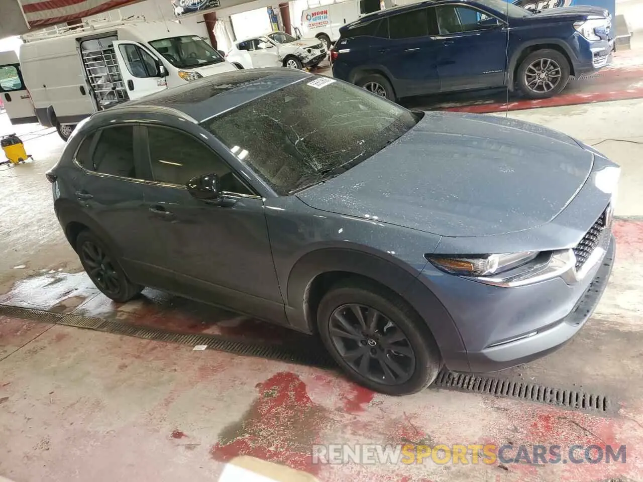 4 Photograph of a damaged car 3MVDMBCM3RM611391 MAZDA CX30 2024