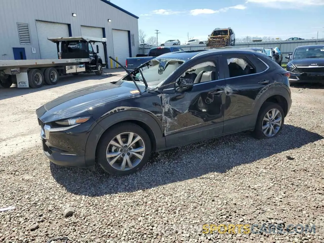 1 Photograph of a damaged car 3MVDMBCM3RM617093 MAZDA CX30 2024