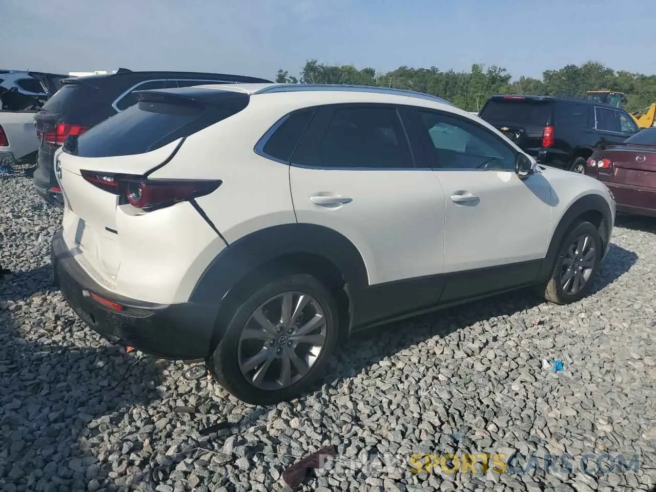 3 Photograph of a damaged car 3MVDMBCM6RM602930 MAZDA CX30 2024