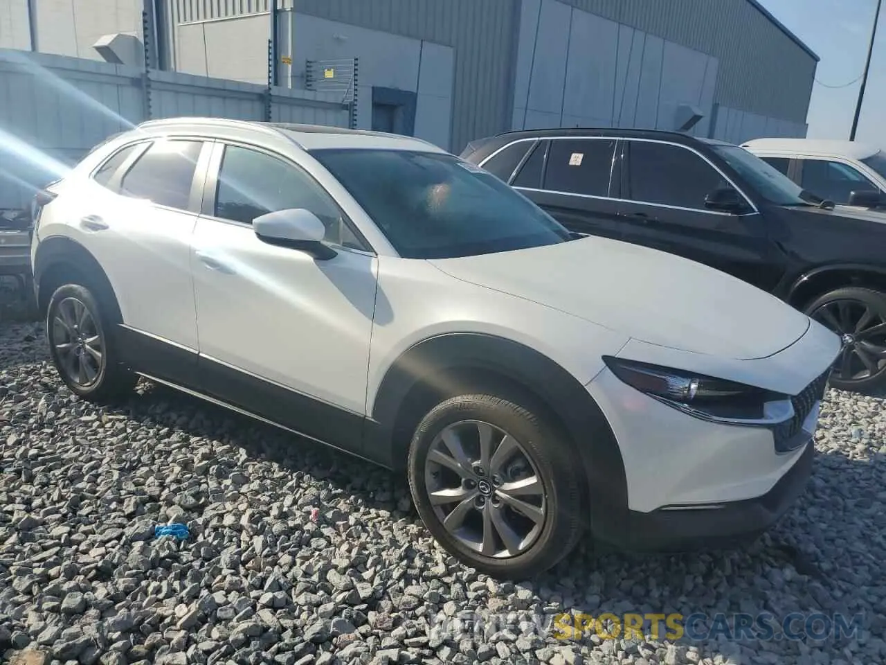 4 Photograph of a damaged car 3MVDMBCM6RM602930 MAZDA CX30 2024