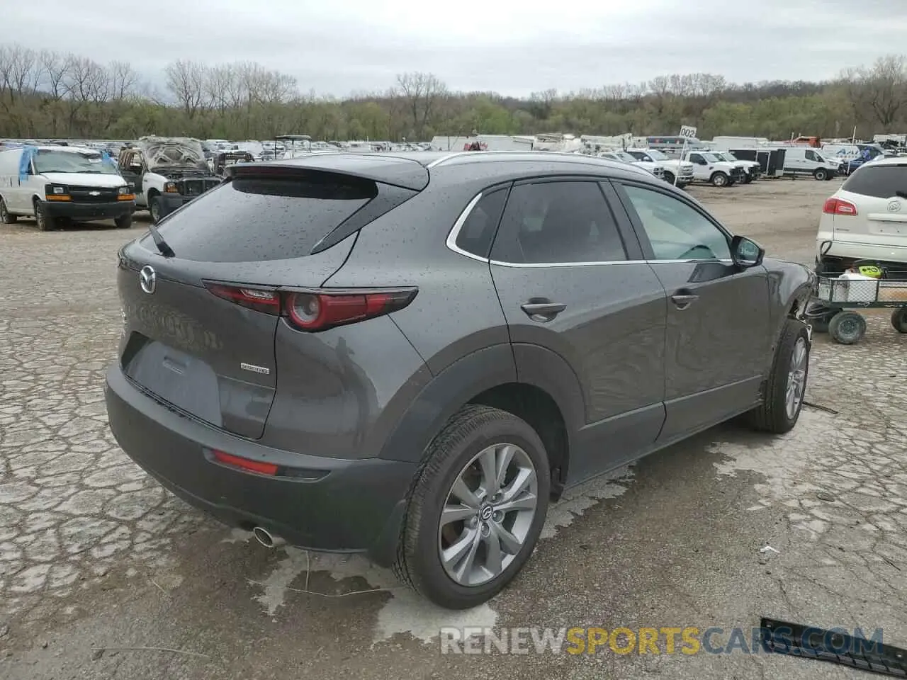 3 Photograph of a damaged car 3MVDMBCM6RM616634 MAZDA CX30 2024
