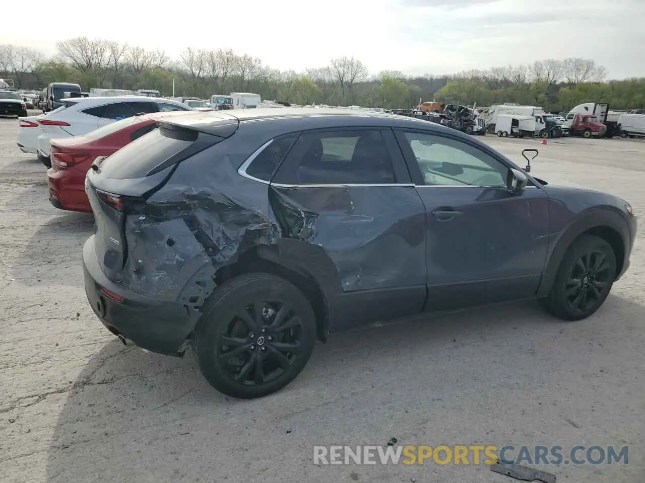 3 Photograph of a damaged car 3MVDMBCM6RM624524 MAZDA CX30 2024