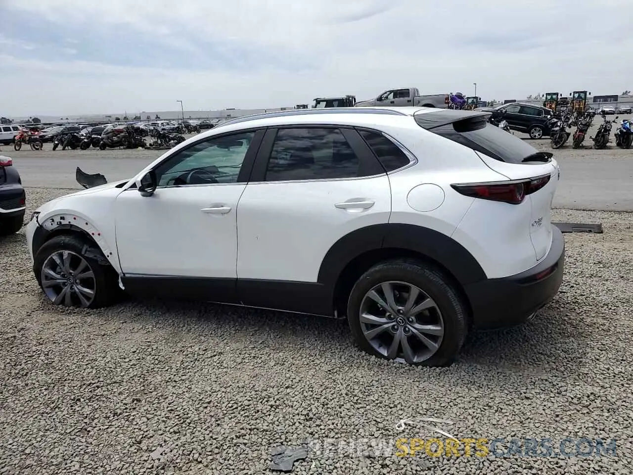 2 Photograph of a damaged car 3MVDMBCM8RM625691 MAZDA CX30 2024