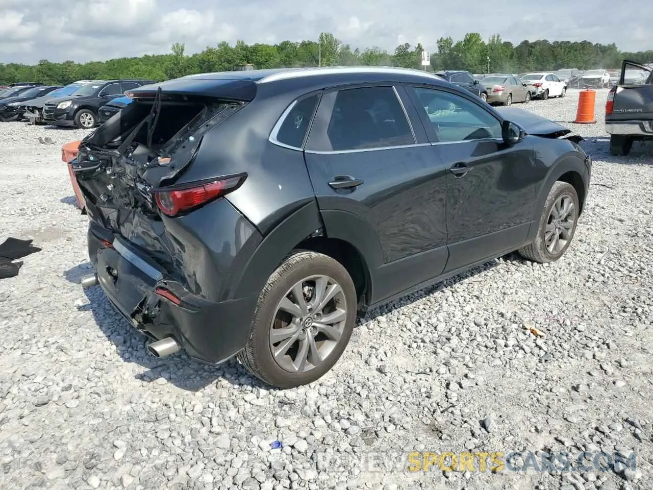 3 Photograph of a damaged car 3MVDMBCM9RM610827 MAZDA CX30 2024