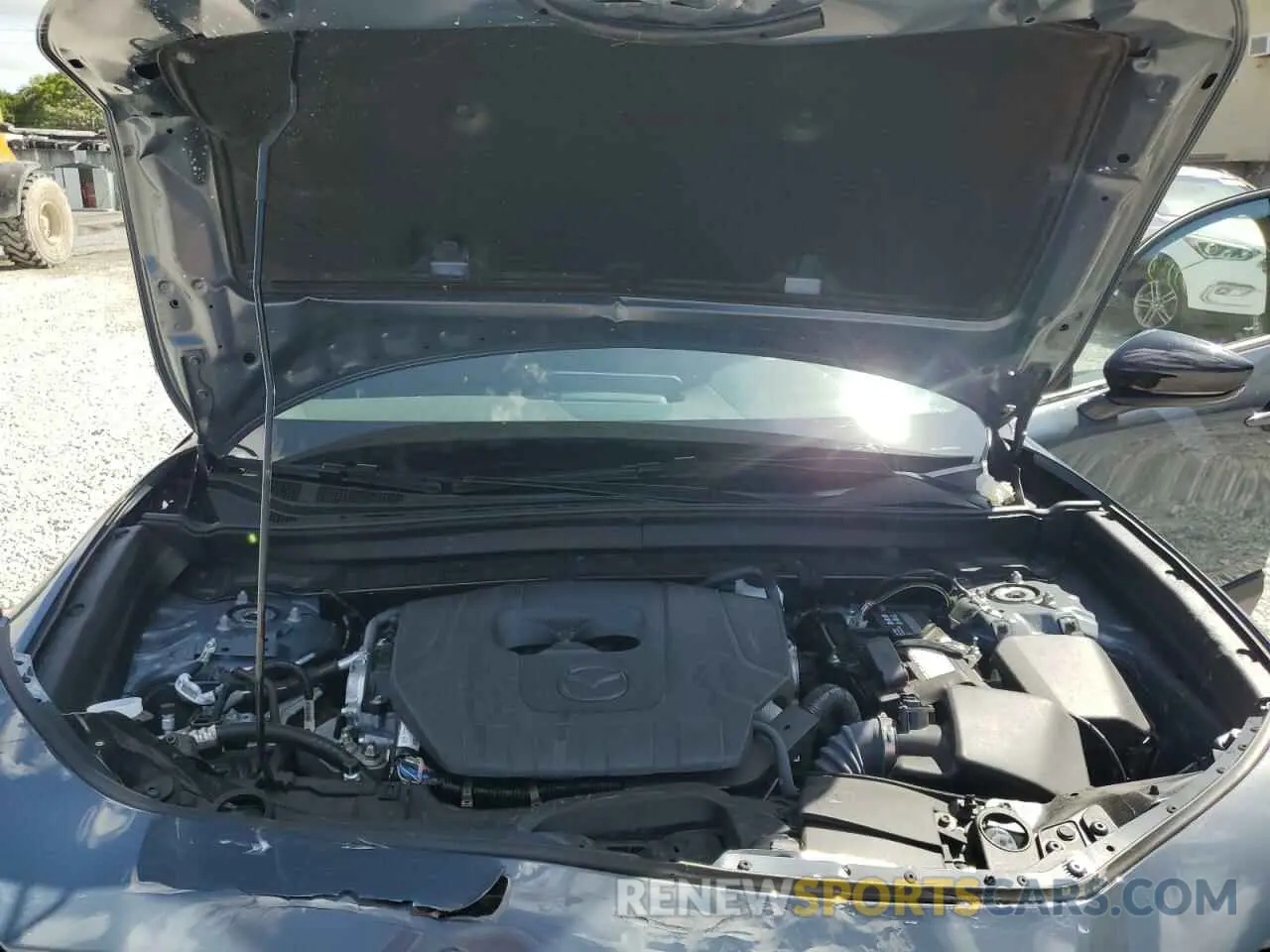 12 Photograph of a damaged car 3MVDMBCMXRM673483 MAZDA CX30 2024