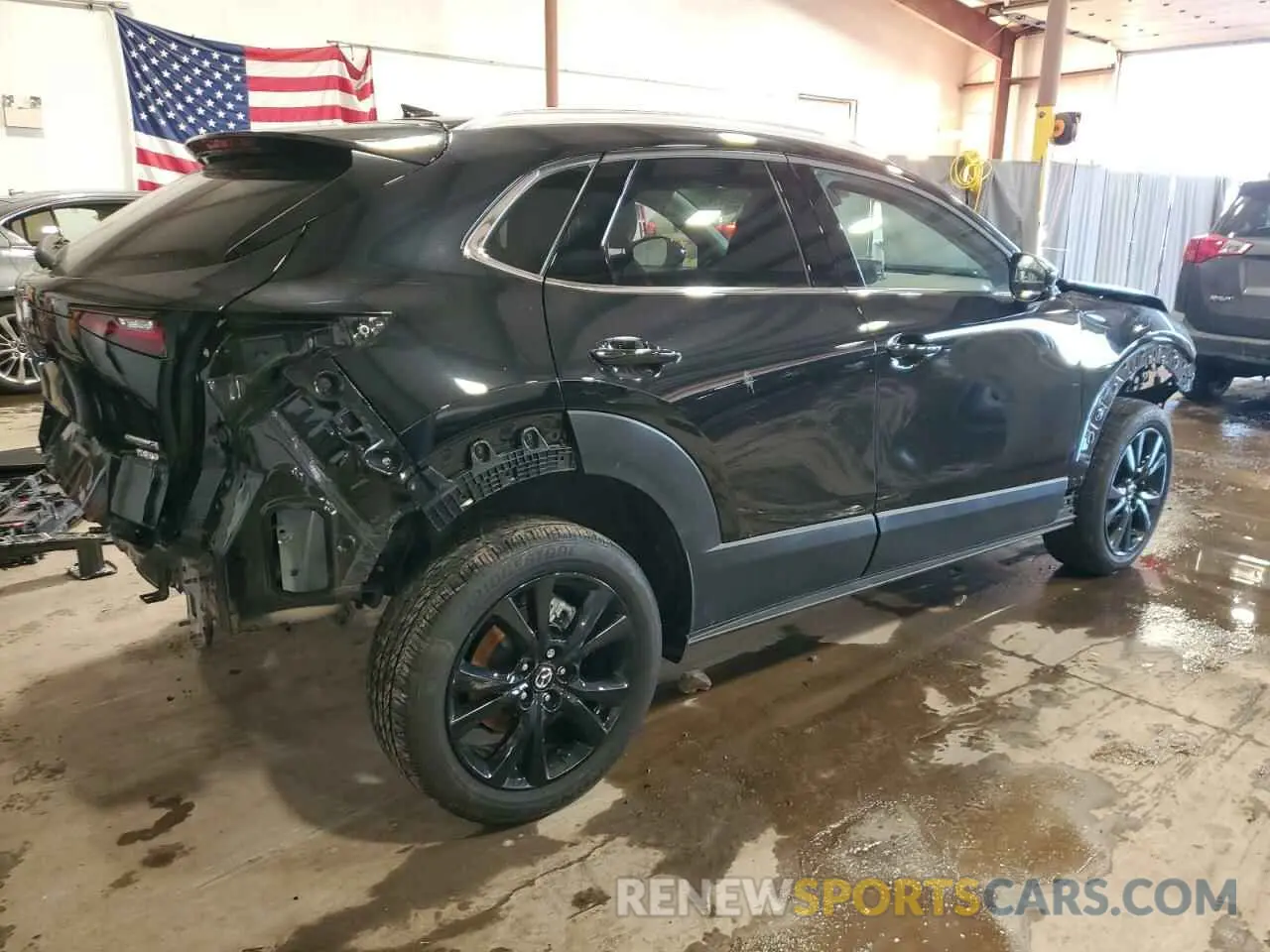 3 Photograph of a damaged car 3MVDMBDY4RM689826 MAZDA CX30 2024