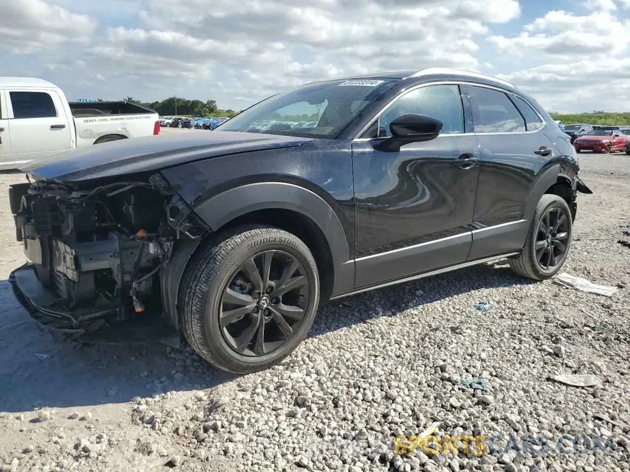 1 Photograph of a damaged car 3MVDMBDY6RM602606 MAZDA CX30 2024