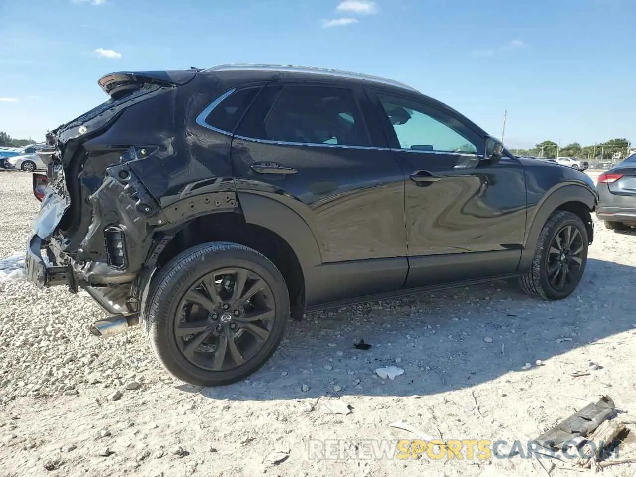 3 Photograph of a damaged car 3MVDMBDY6RM602606 MAZDA CX30 2024