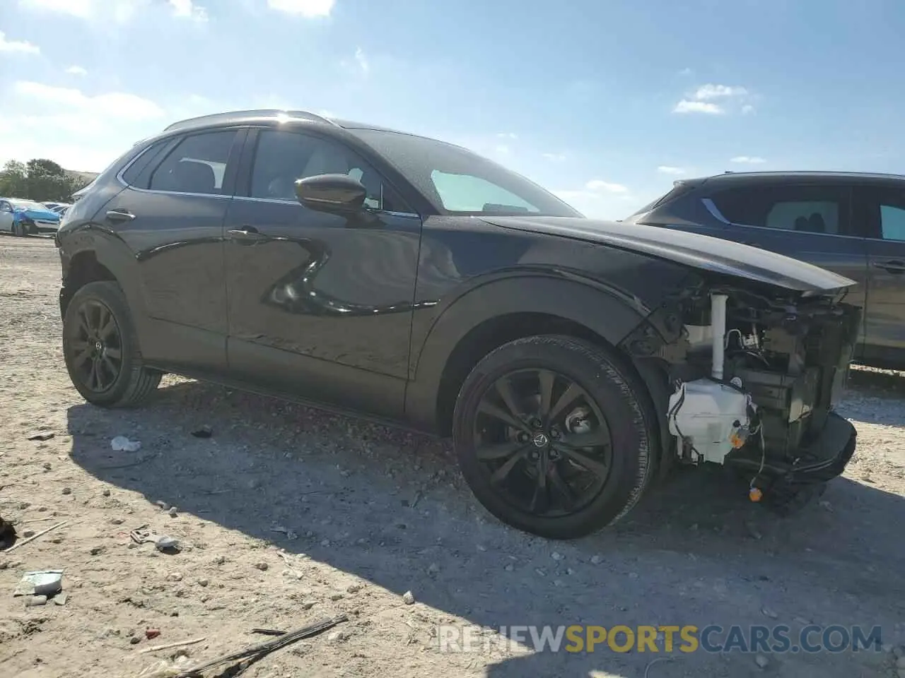 4 Photograph of a damaged car 3MVDMBDY6RM602606 MAZDA CX30 2024
