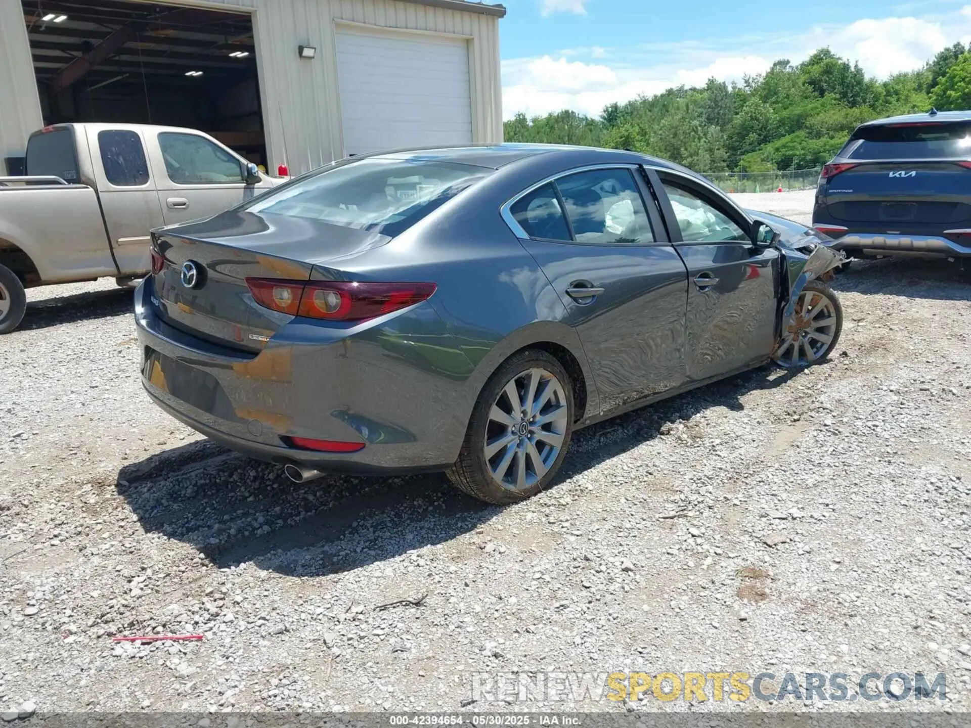 4 Photograph of a damaged car 3MZBPABM3PM361334 MAZDA MAZDA3 2023
