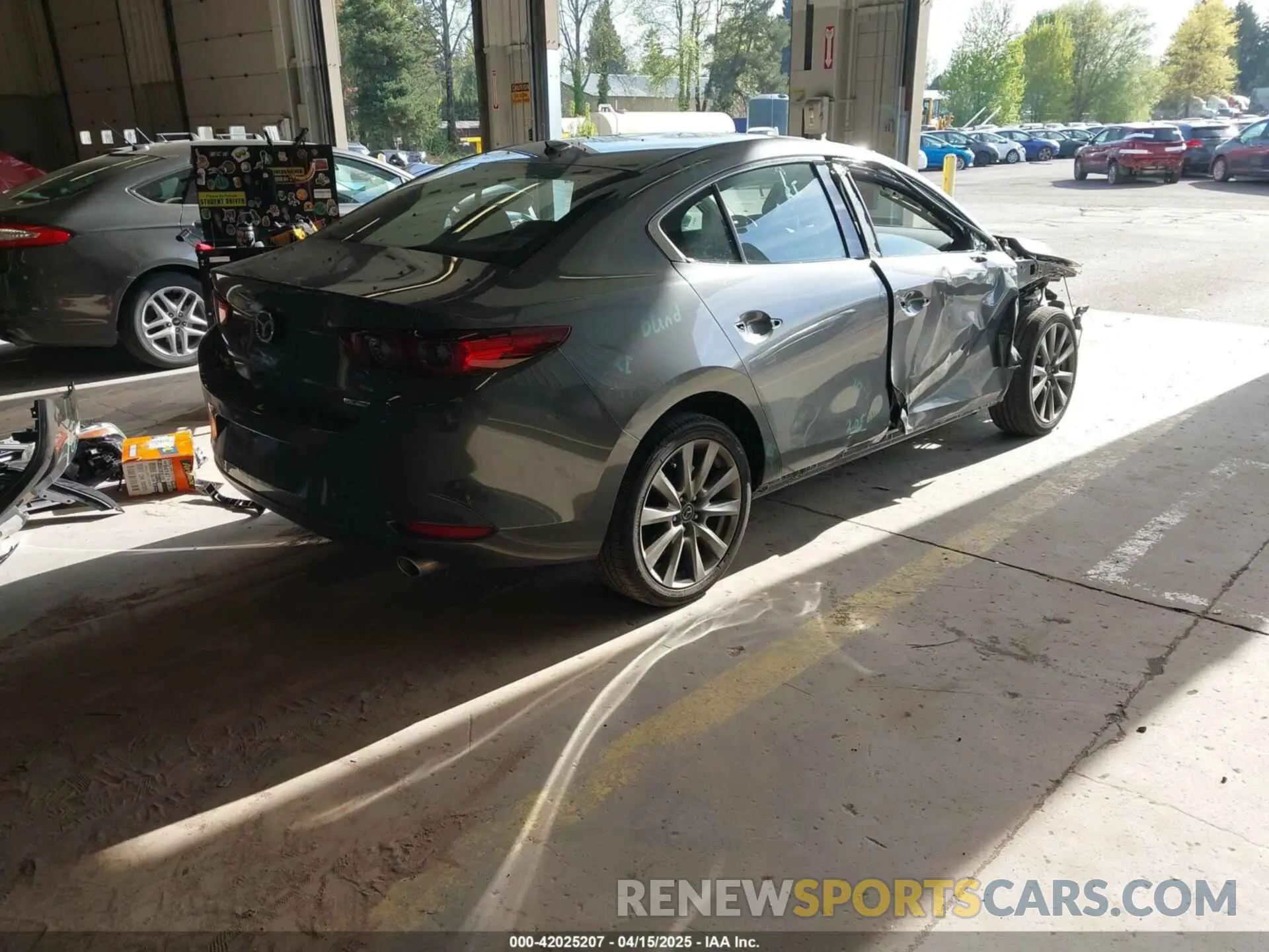 4 Photograph of a damaged car 3MZBPBDM5PM374492 MAZDA MAZDA3 2023