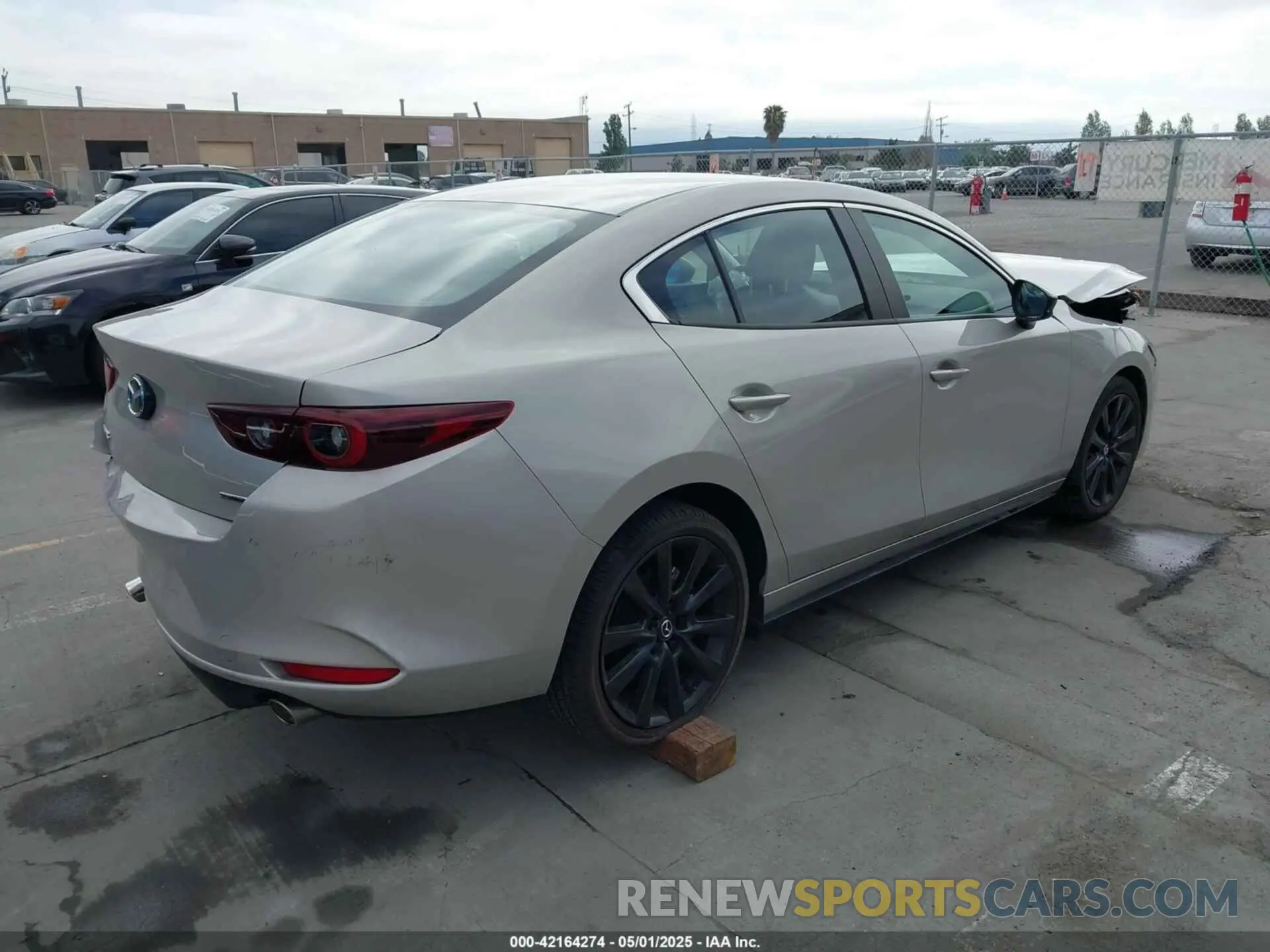 4 Photograph of a damaged car 3MZBPABM2RM422045 MAZDA MAZDA3 2024