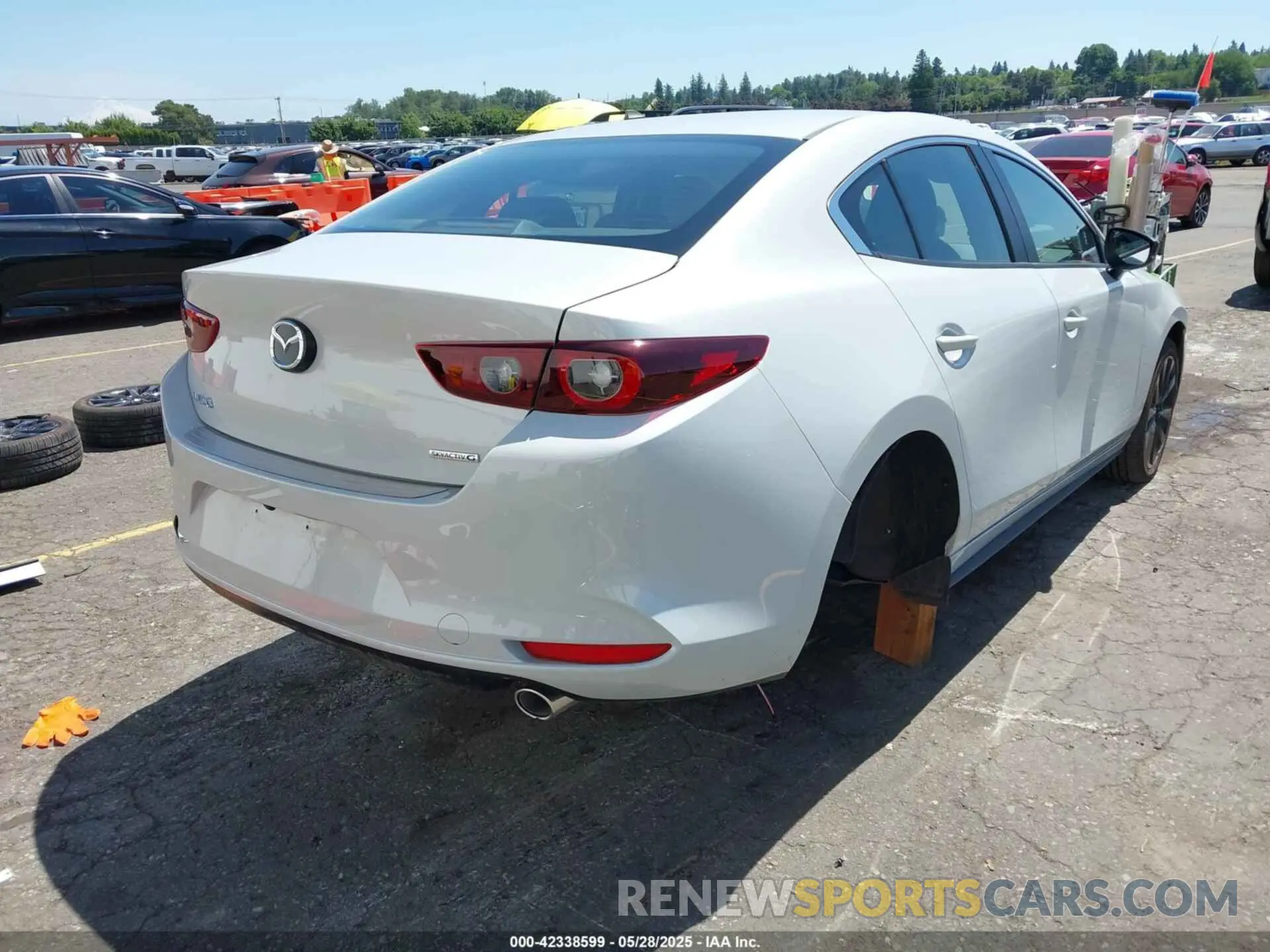 4 Photograph of a damaged car 3MZBPABM8RM437245 MAZDA MAZDA3 2024