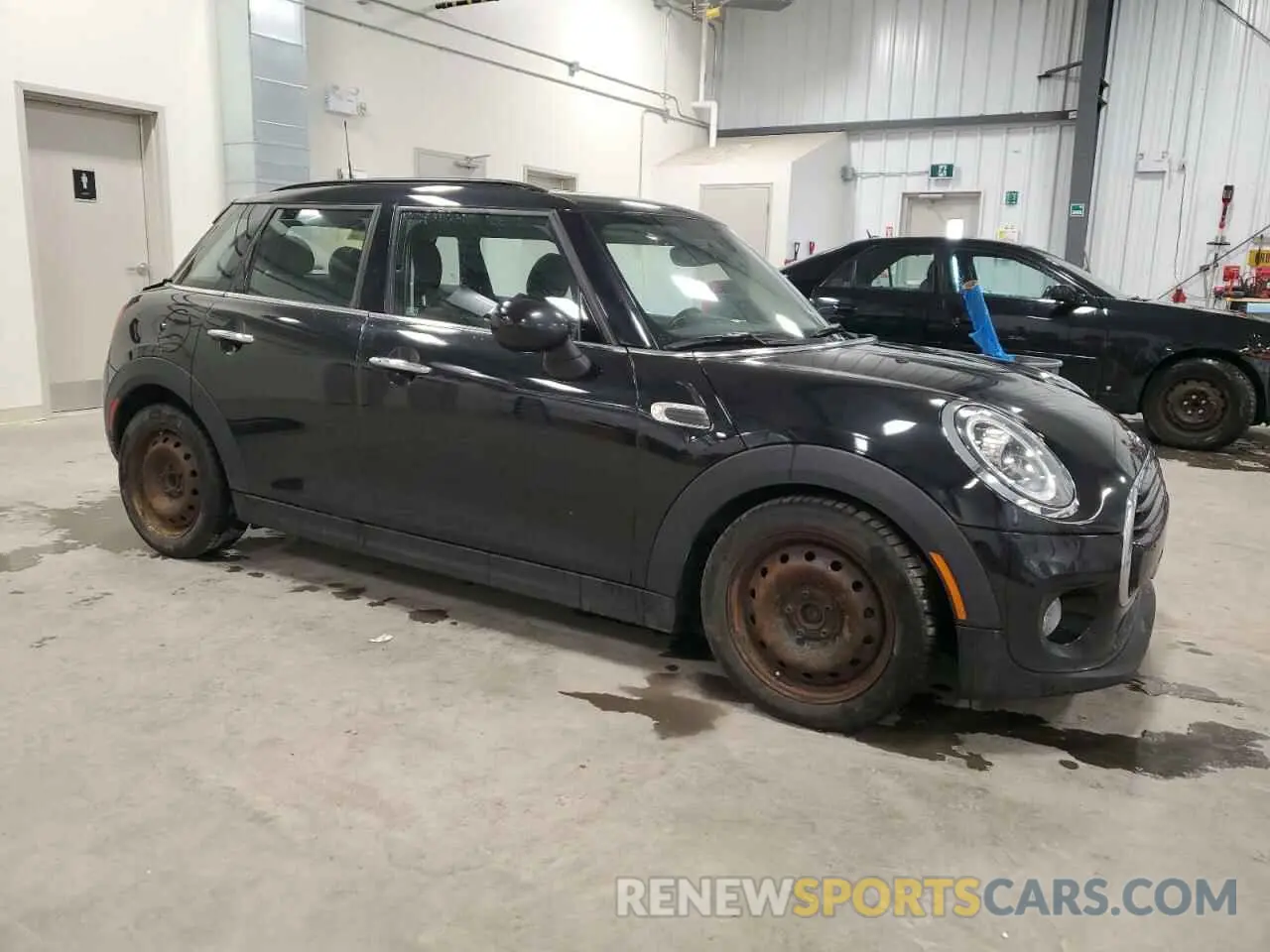 4 Photograph of a damaged car WMWXU1C58K2H74102 MINI COOPER 2019