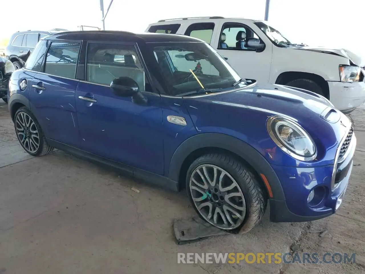 4 Photograph of a damaged car WMWXU3C58K2H55626 MINI COOPER 2019