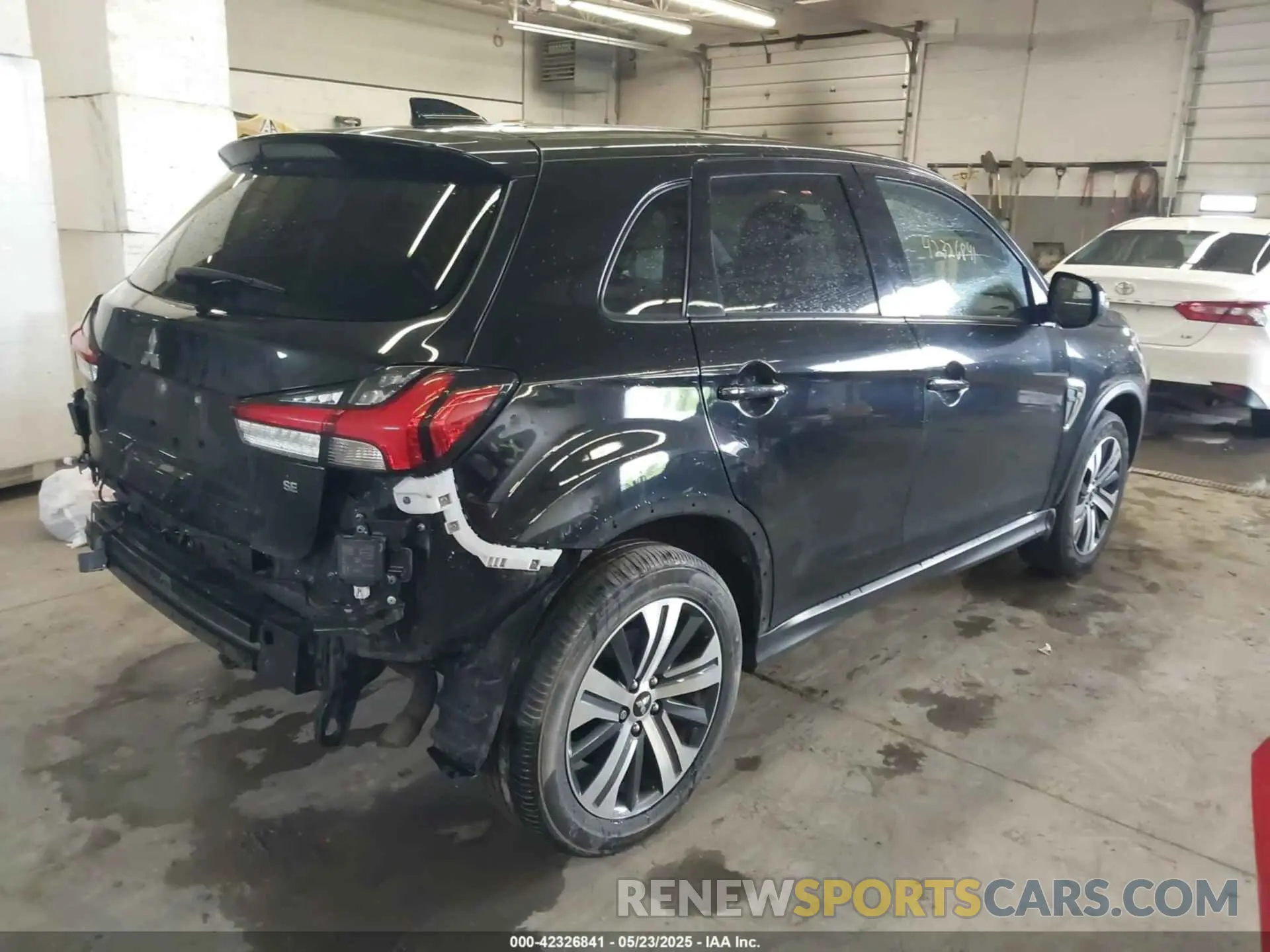 4 Photograph of a damaged car JA4APVAU9NU017355 MITSUBISHI OUTLANDER SPORT 2022