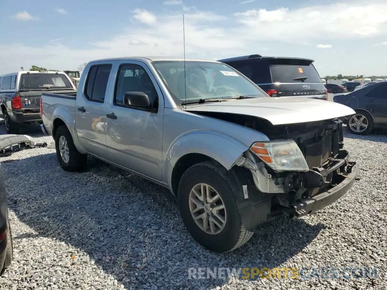 4 Photograph of a damaged car 1N6AD0ER3KN724395 NISSAN FRONTIER 2019