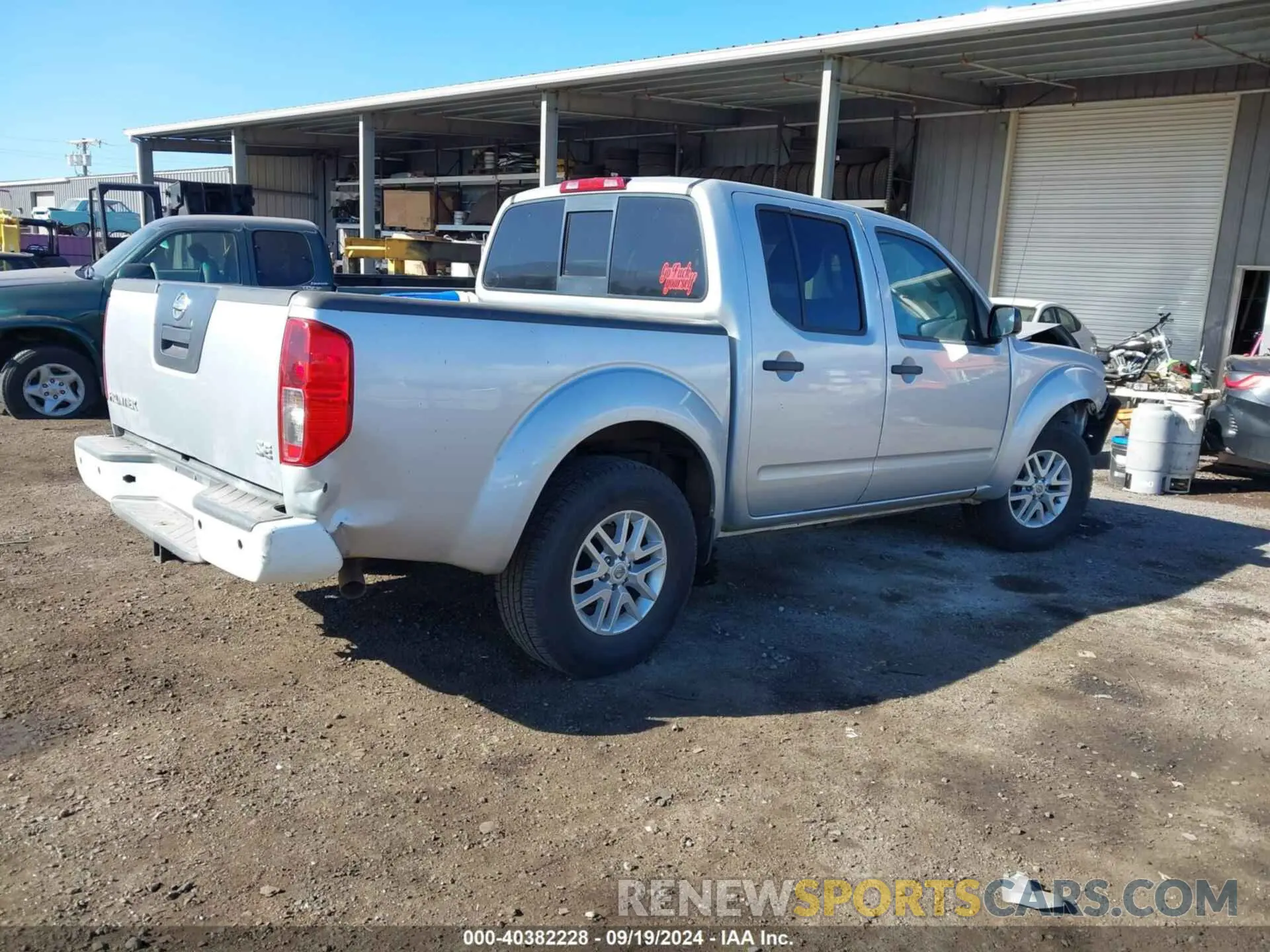 4 Photograph of a damaged car 1N6AD0ER7KN785779 NISSAN FRONTIER 2019