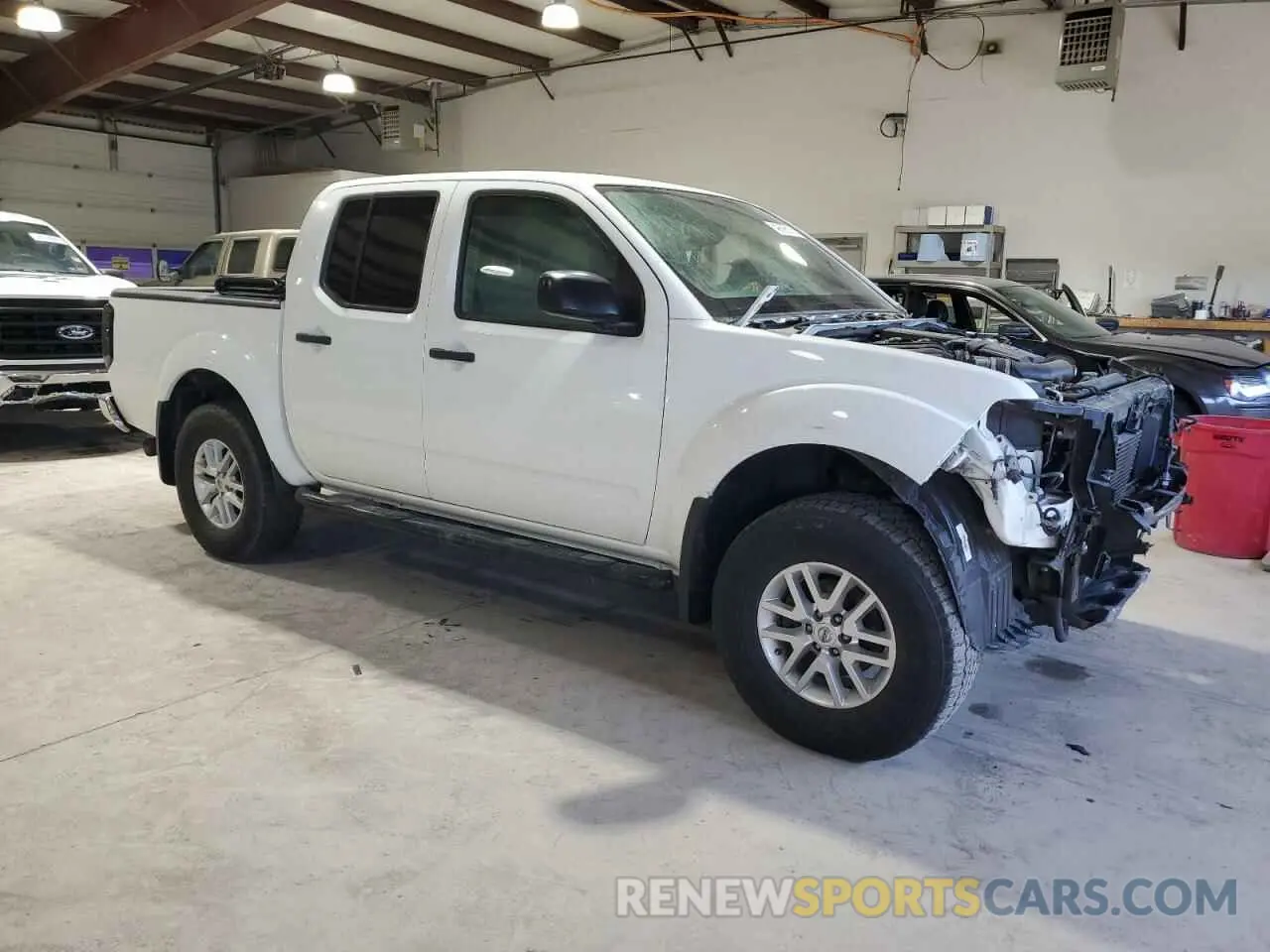 4 Photograph of a damaged car 1N6AD0EV1KN736283 NISSAN FRONTIER 2019