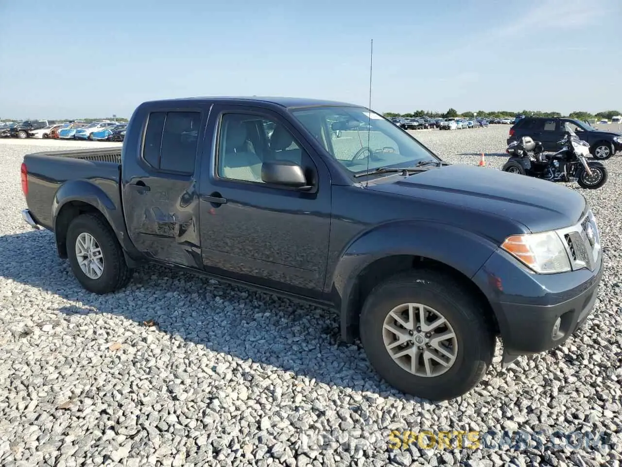 4 Photograph of a damaged car 1N6AD0EV4KN786630 NISSAN FRONTIER 2019