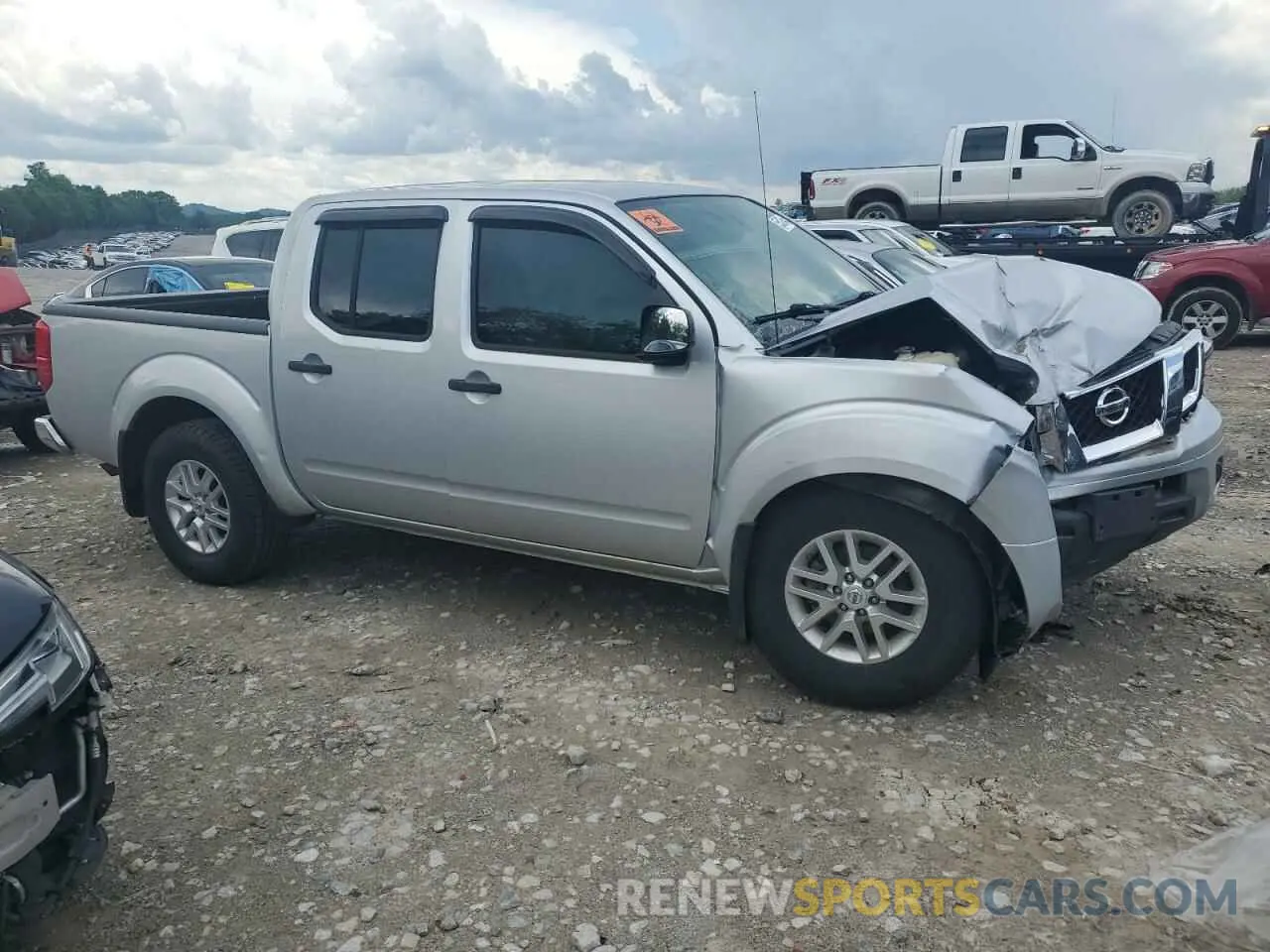4 Photograph of a damaged car 1N6AD0EV6KN738319 NISSAN FRONTIER 2019