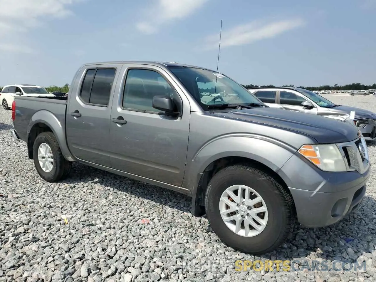 4 Photograph of a damaged car 1N6AD0EV6KN783423 NISSAN FRONTIER 2019