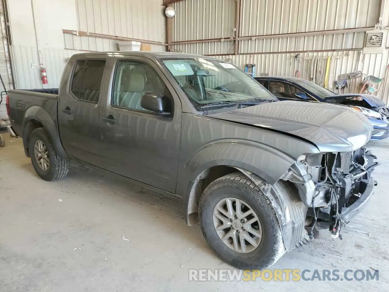 4 Photograph of a damaged car 1N6DD0ER9KN783352 NISSAN FRONTIER 2019