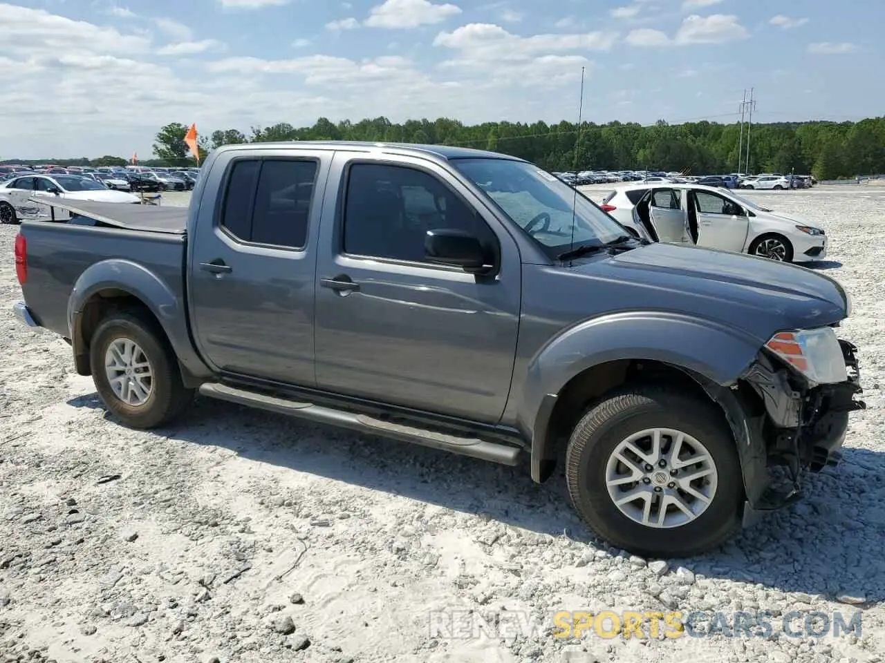4 Photograph of a damaged car 1N6DD0EV7KN723521 NISSAN FRONTIER 2019