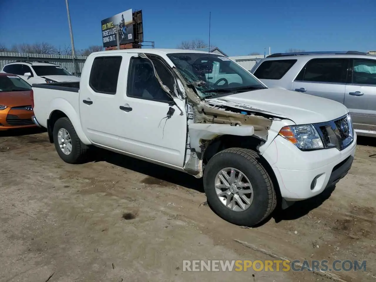 4 Photograph of a damaged car 1N6DD0EV9KN875834 NISSAN FRONTIER 2019