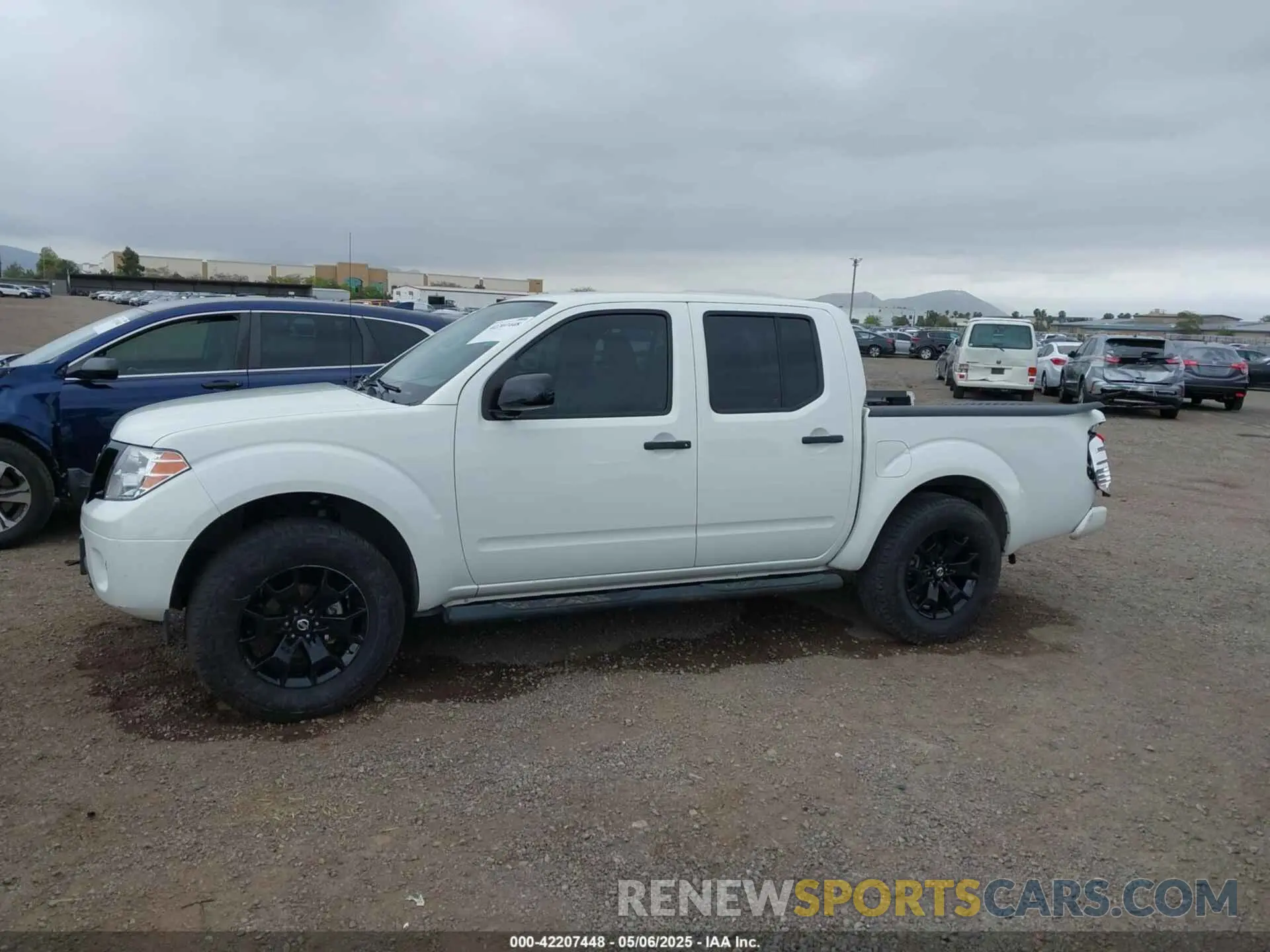 14 Photograph of a damaged car 1N6ED0EA3MN706638 NISSAN FRONTIER 2021