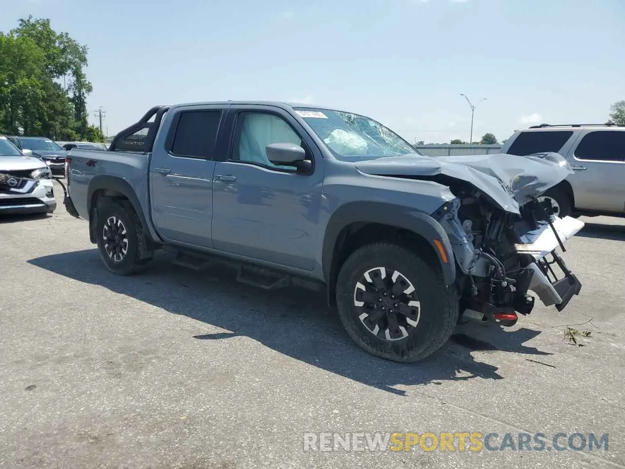 4 Photograph of a damaged car 1N6ED1EK0NN665496 NISSAN FRONTIER 2022