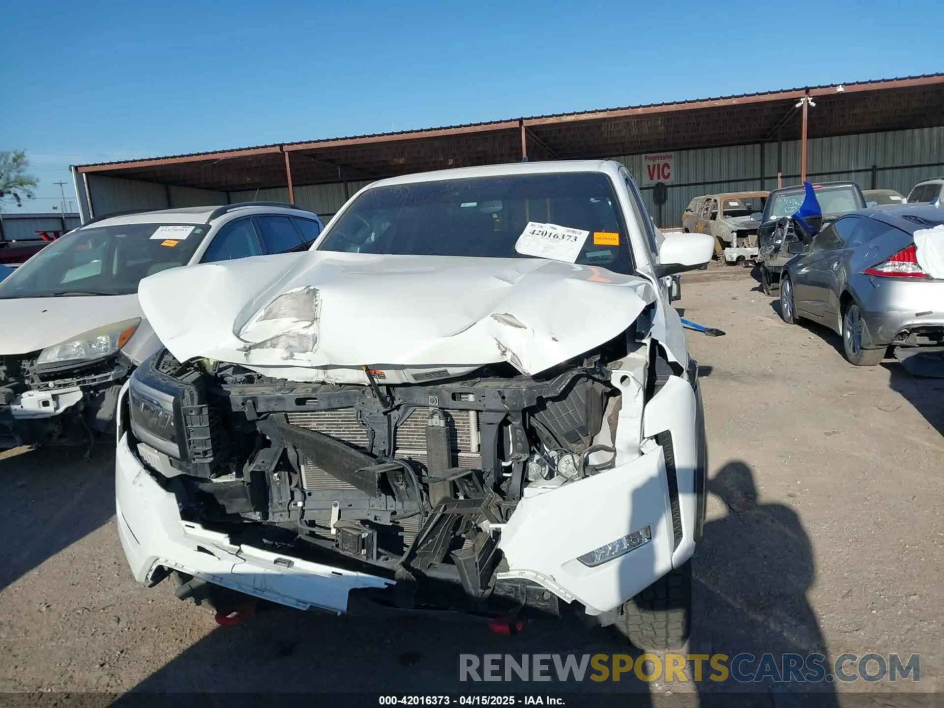 13 Photograph of a damaged car 1N6ED1EK4NN656770 NISSAN FRONTIER 2022
