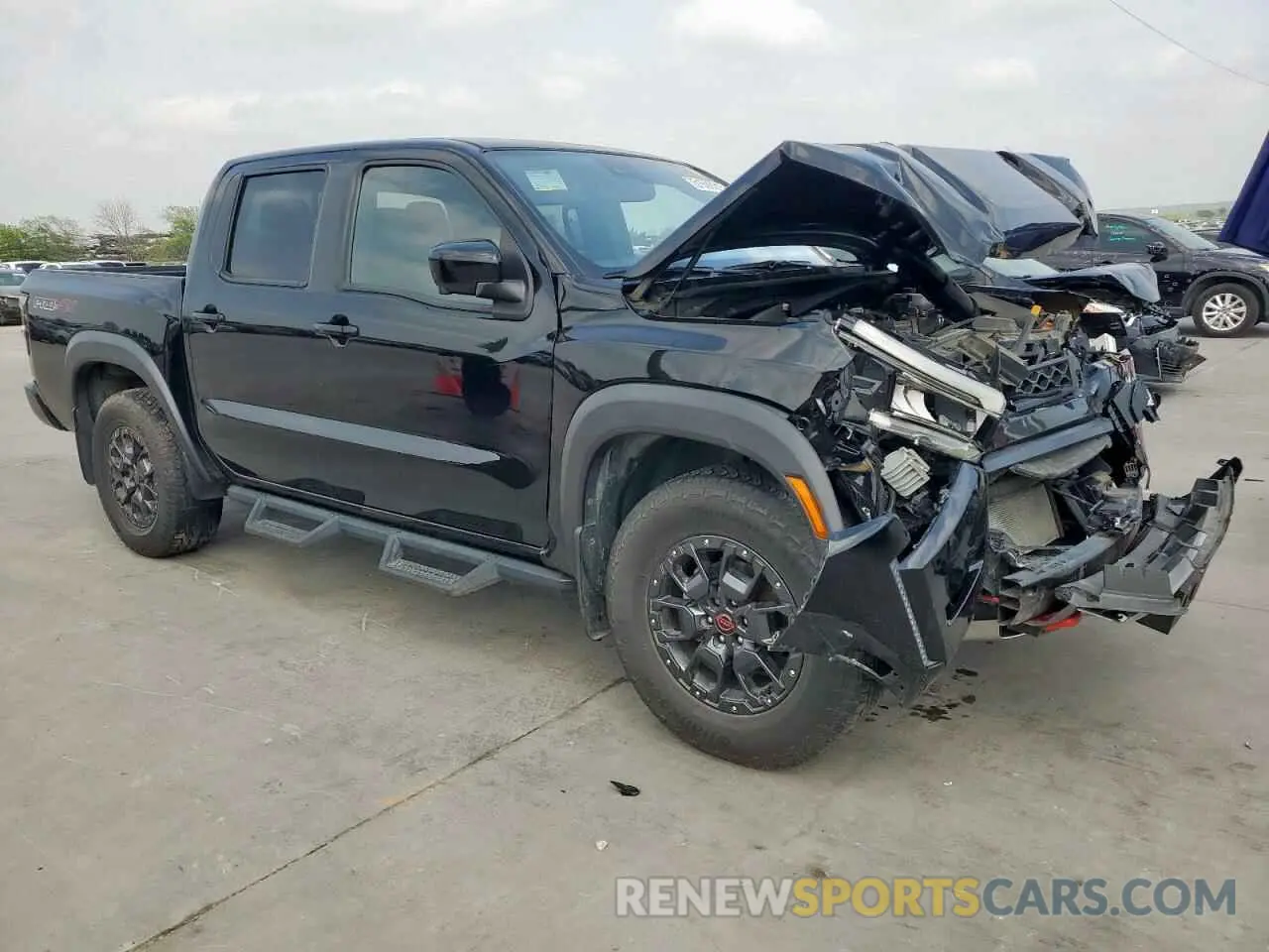 4 Photograph of a damaged car 1N6ED1EK6NN622667 NISSAN FRONTIER 2022