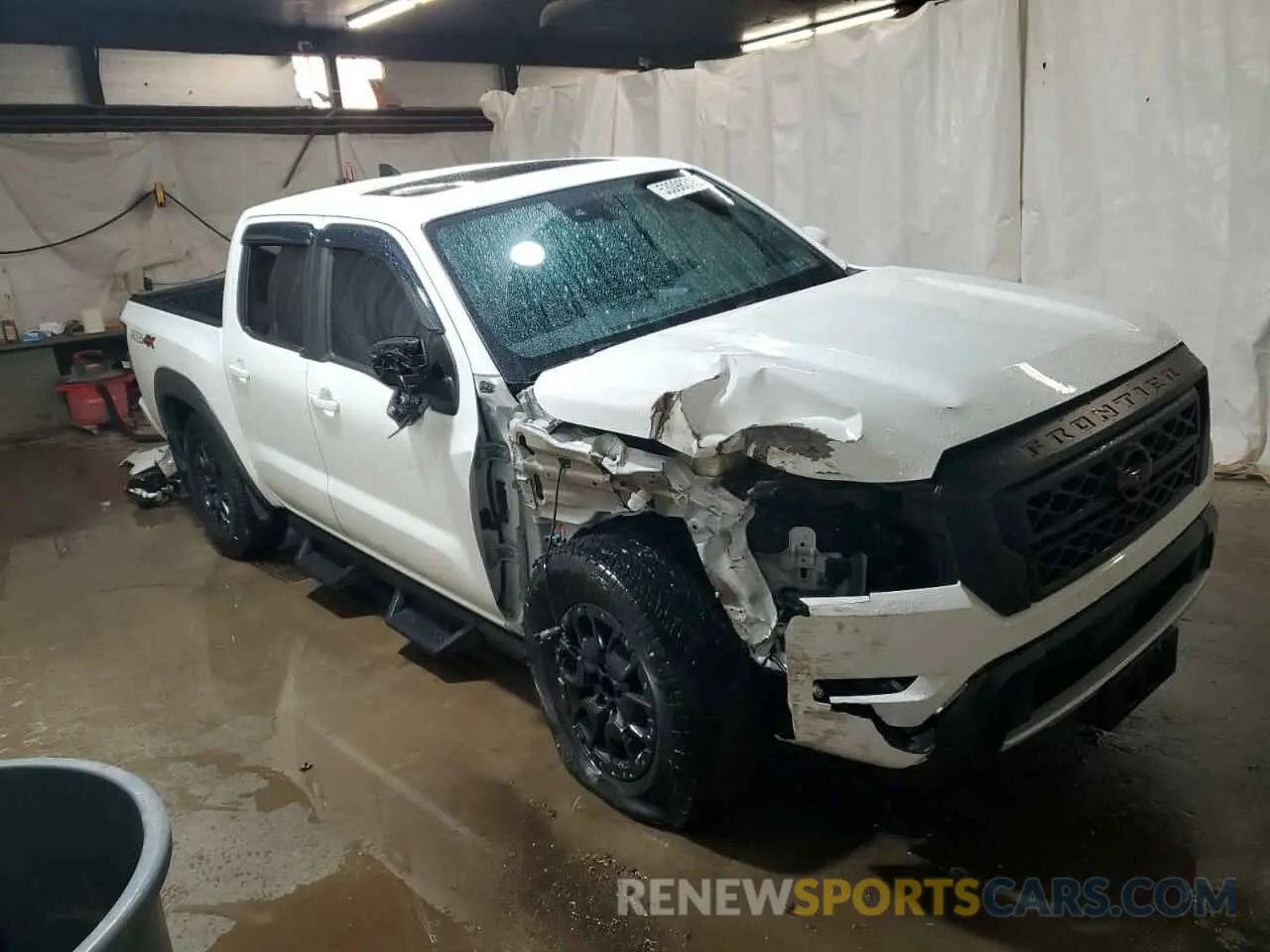 4 Photograph of a damaged car 1N6ED1EK9NN613381 NISSAN FRONTIER 2022
