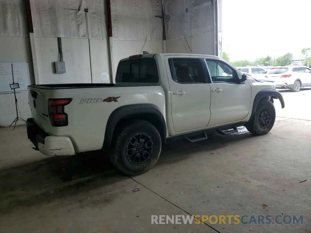 3 Photograph of a damaged car 1N6ED1EK9NN692552 NISSAN FRONTIER 2022