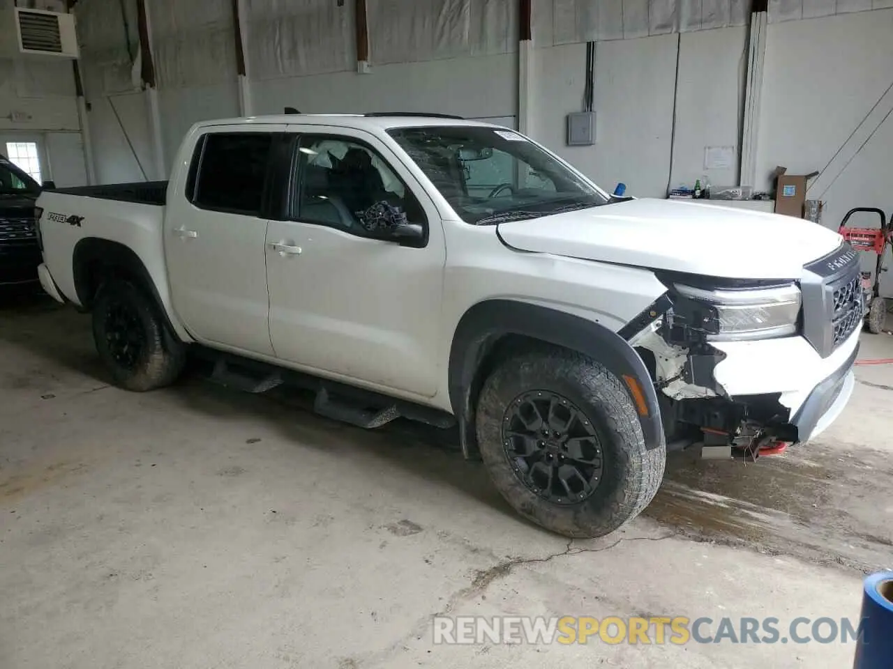 4 Photograph of a damaged car 1N6ED1EK9NN692552 NISSAN FRONTIER 2022
