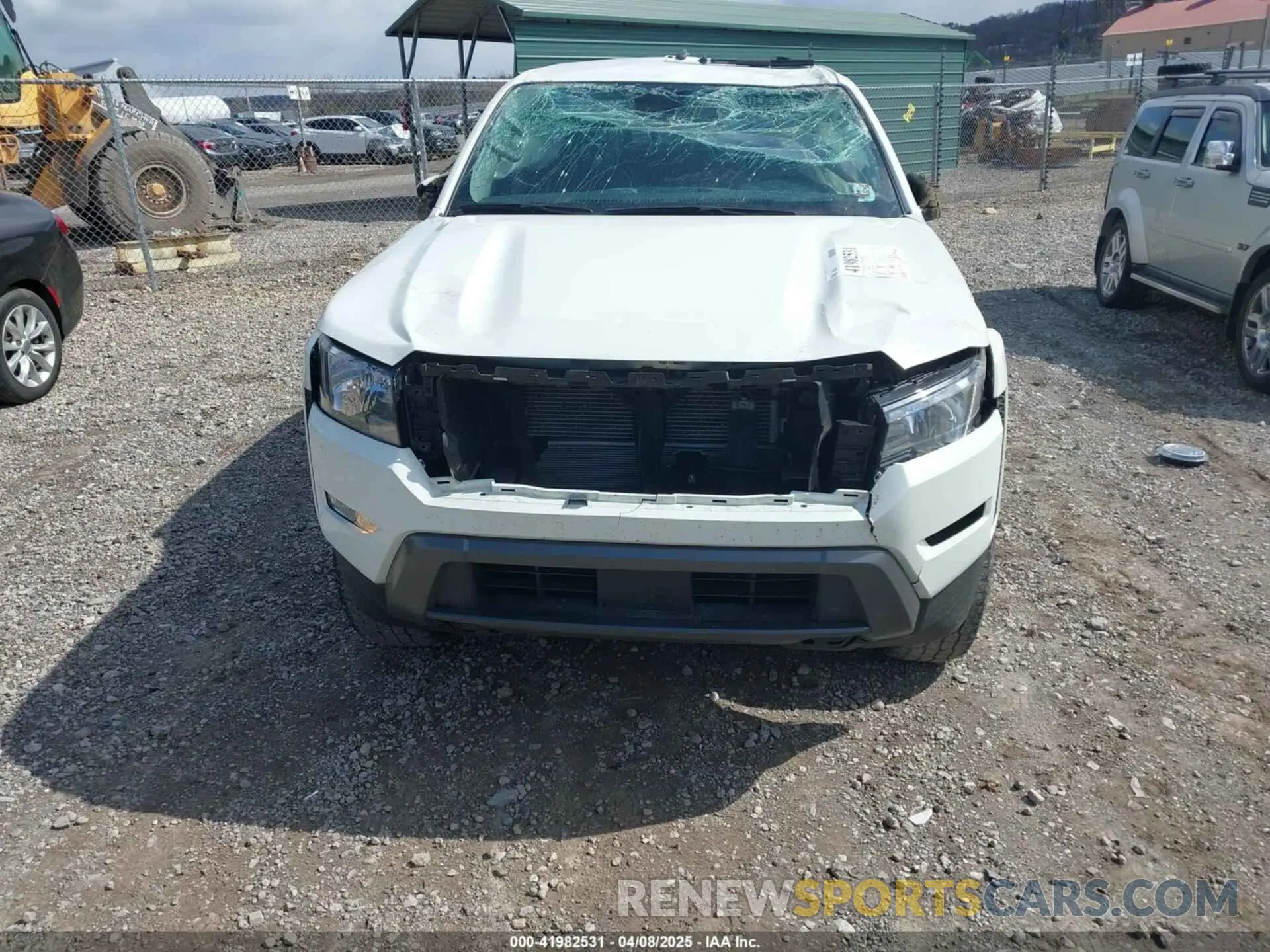 13 Photograph of a damaged car 1N6ED1FK7NN623034 NISSAN FRONTIER 2022